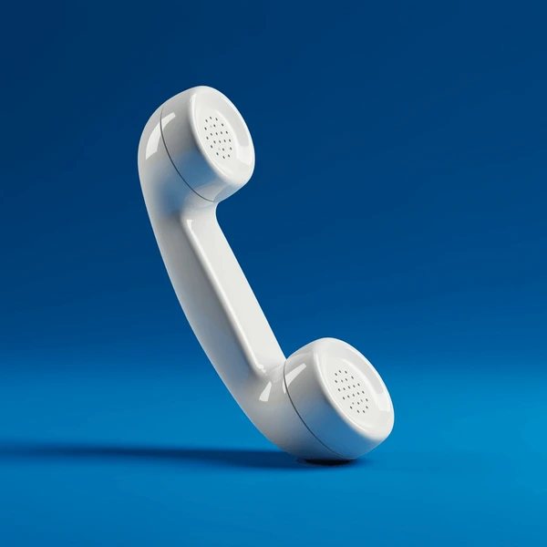 A classic phone receiver on a blue background